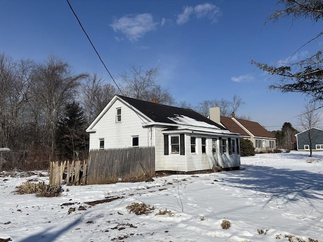 view of snow covered property