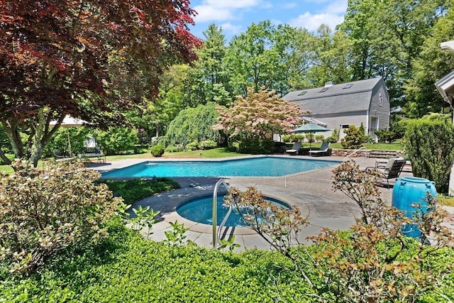 100 Parmenter Rd, Framingham, MA 01701 - swimming pool featuring a hot tub and a patio