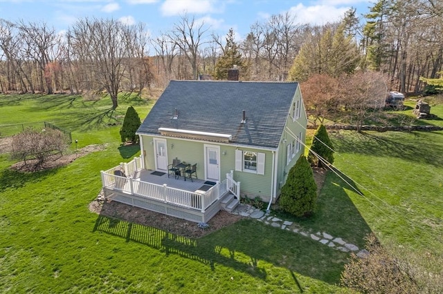 100 Parmenter Rd, Framingham, MA 01701 - back of house with a chimney, a yard, and a deck