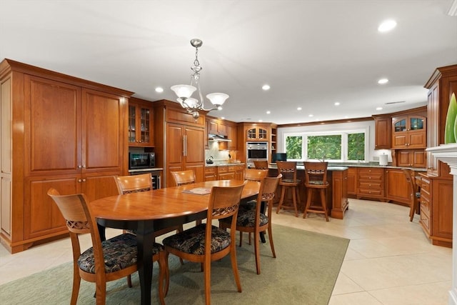 100 Parmenter Rd, Framingham, MA 01701 - dining space with recessed lighting, light tile patterned flooring, and a chandelier