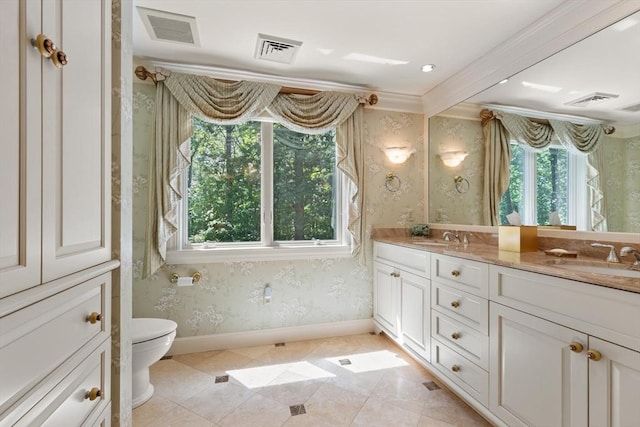 100 Parmenter Rd, Framingham, MA 01701 - bathroom featuring wallpapered walls, crown molding, double vanity, and tile patterned floors