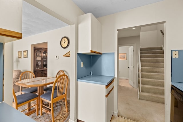 view of carpeted dining area