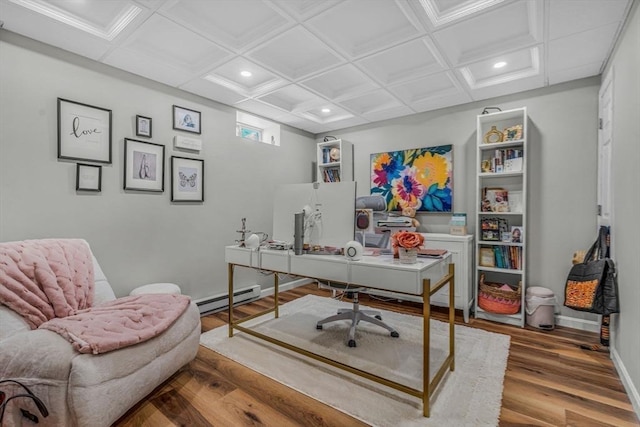 office area featuring wood finished floors, baseboards, coffered ceiling, recessed lighting, and a baseboard heating unit