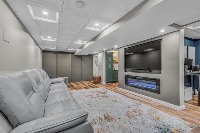 living room featuring recessed lighting, wood finished floors, baseboards, and coffered ceiling