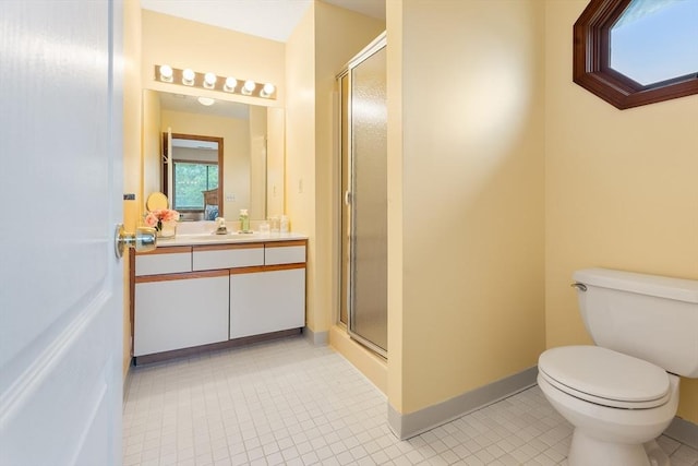25 Ash Ln Unit 25, Agawam, MA 01001 - full bathroom featuring vanity, a stall shower, tile patterned flooring, and toilet