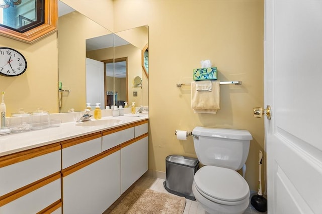 25 Ash Ln Unit 25, Agawam, MA 01001 - bathroom with vanity, toilet, baseboards, and tile patterned flooring