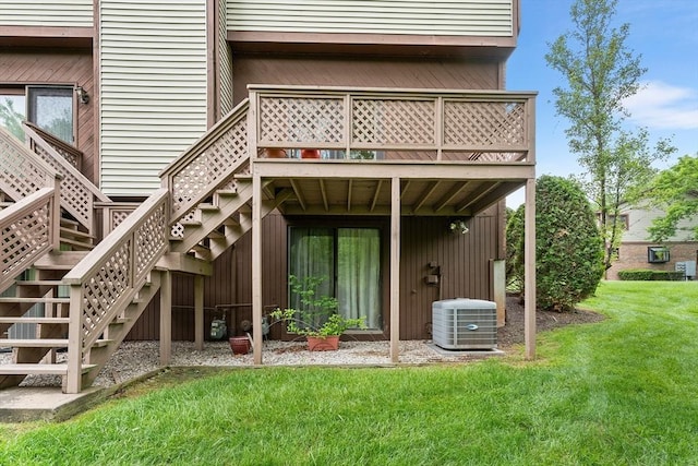25 Ash Ln Unit 25, Agawam, MA 01001 - back of house featuring central AC unit, stairs, and a yard