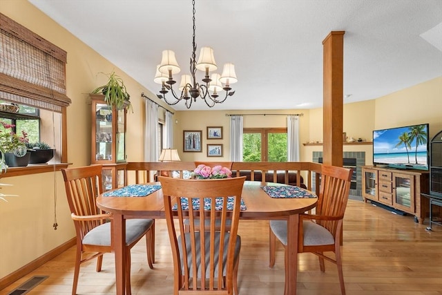 25 Ash Ln Unit 25, Agawam, MA 01001 - dining area with light wood finished floors and a chandelier