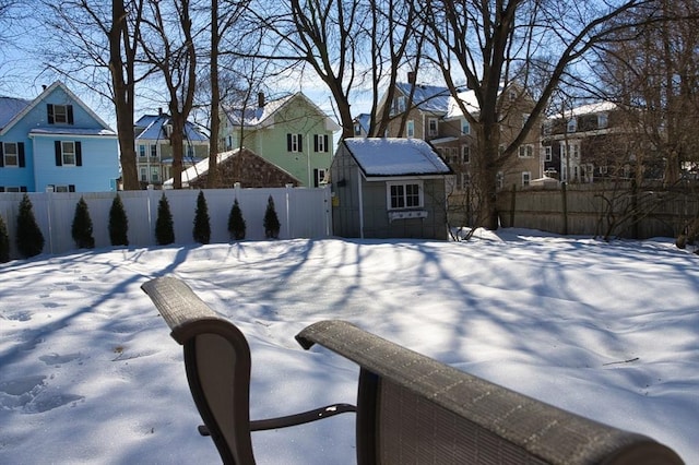 details featuring fence private yard and a residential view