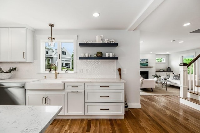 84 S St, Rockport, MA 01966 - bar area featuring stainless steel dishwasher, a sink, wood finished floors, recessed lighting, and tasteful backsplash