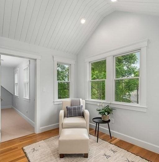 84 S St, Rockport, MA 01966 - sitting room with vaulted ceiling, baseboards, and wood finished floors