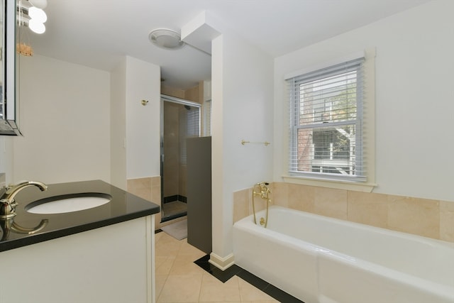 bathroom featuring vanity, separate shower and tub, and tile patterned floors