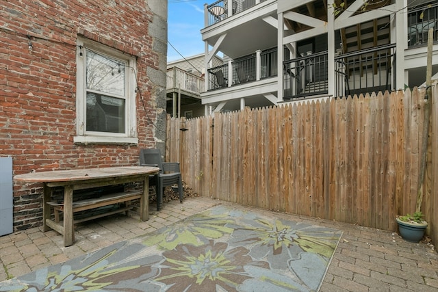 view of patio / terrace with a balcony