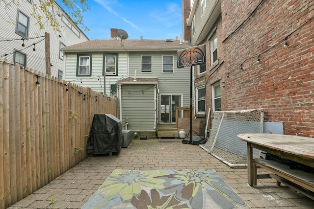 back of house featuring a patio