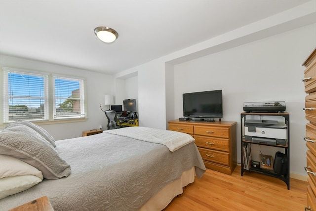 bedroom featuring light hardwood / wood-style flooring