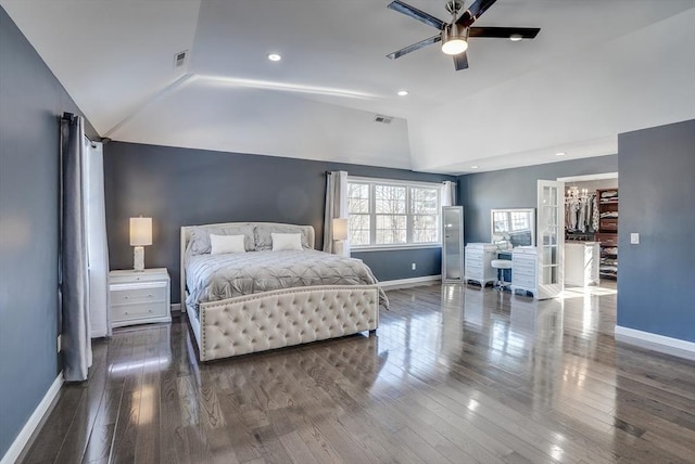 bedroom featuring ceiling fan, lofted ceiling, and hardwood / wood-style floors