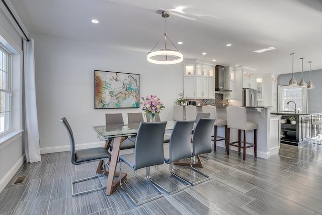 dining room featuring sink