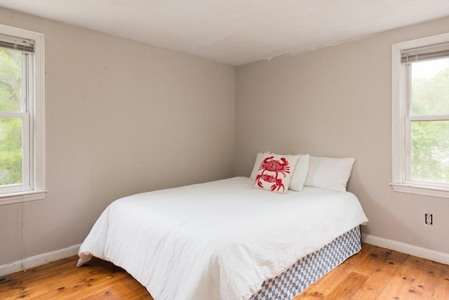 100 Kelley Rd, Barnstable, MA 02601 - bedroom with hardwood / wood-style floors and baseboards