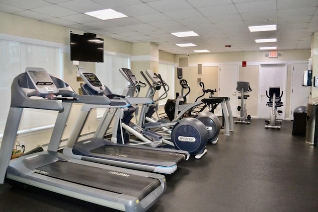 gym with a drop ceiling