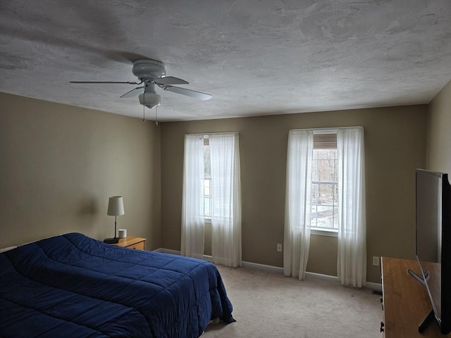132 Bean Porridge Hill Rd, Westminster, MA 01473 - bedroom with baseboards, light colored carpet, a ceiling fan, and a textured ceiling