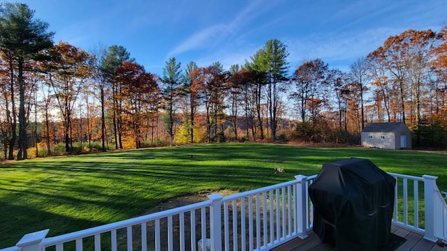 132 Bean Porridge Hill Rd, Westminster, MA 01473 - view of grassy yard with a storage shed, an outdoor structure, a deck, and view of scattered trees
