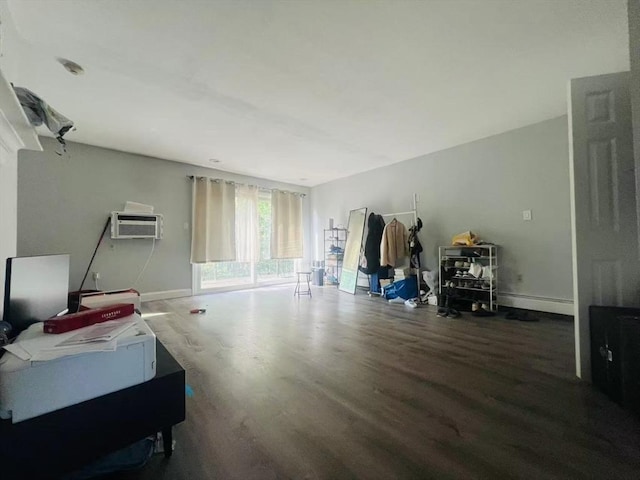 3 Fernview Ave Unit 11, North Andover, MA 01845 - misc room with wood finished floors, baseboards, a wall mounted AC, and a baseboard heating unit