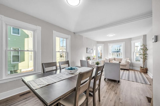 dining room featuring light hardwood / wood-style flooring