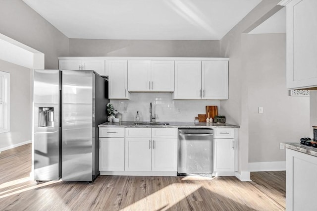 kitchen featuring white cabinetry and stainless steel appliances