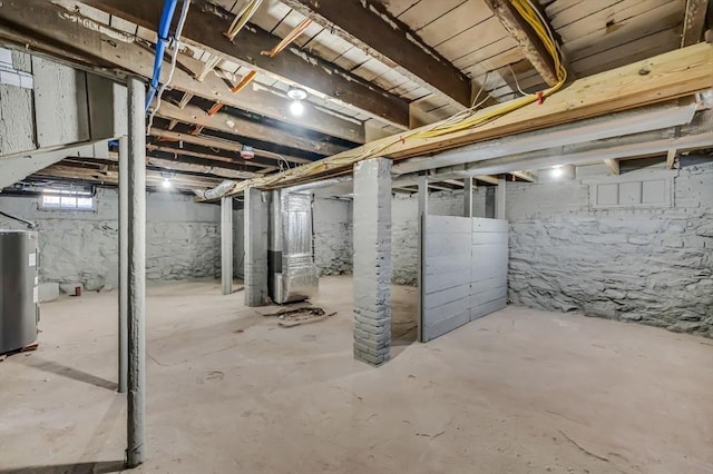 basement featuring water heater