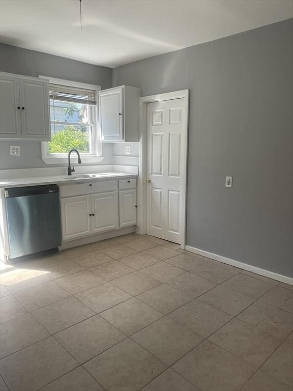 38 Chatham St, Lynn, MA 01902 - kitchen featuring dishwasher, white cabinets, light countertops, and light tile patterned floors