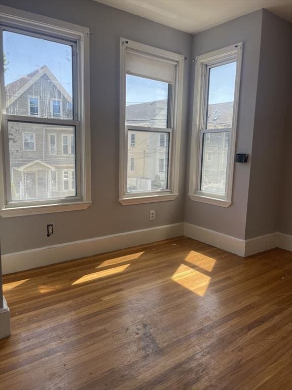 38 Chatham St, Lynn, MA 01902 - unfurnished room with baseboards and wood finished floors