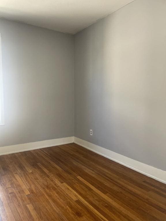 38 Chatham St, Lynn, MA 01902 - unfurnished room with dark wood finished floors and baseboards