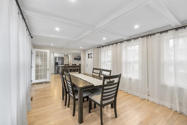 dining space with beam ceiling, recessed lighting, light wood-style flooring, and coffered ceiling