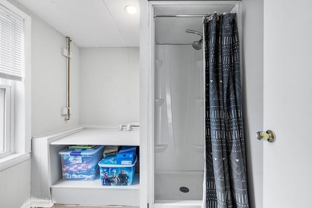 bathroom with curtained shower