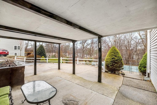 view of patio / terrace featuring fence