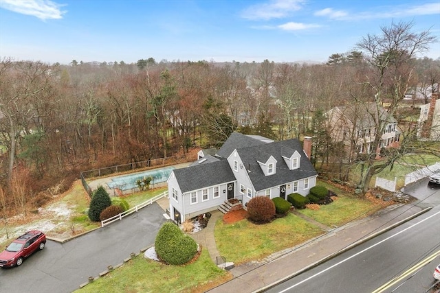 drone / aerial view featuring a view of trees