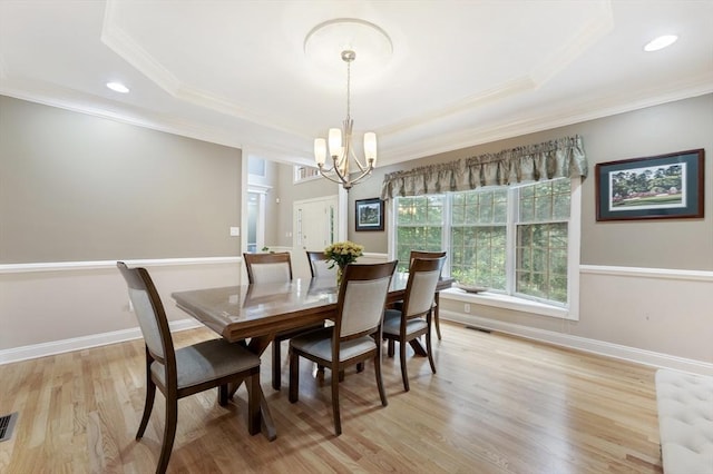 138 Fairview St, Holliston, MA 01746 - dining room featuring a raised ceiling, a chandelier, crown molding, light wood-type flooring, and recessed lighting