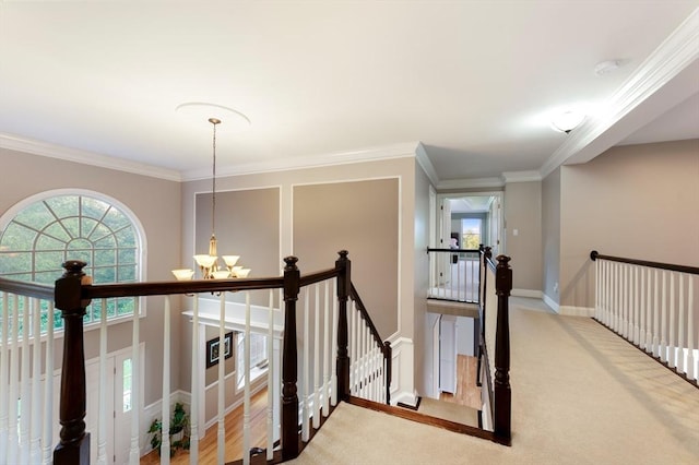138 Fairview St, Holliston, MA 01746 - corridor with a chandelier, an upstairs landing, crown molding, and carpet flooring