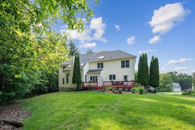138 Fairview St, Holliston, MA 01746 - back of house featuring a wooden deck, a lawn, and a chimney