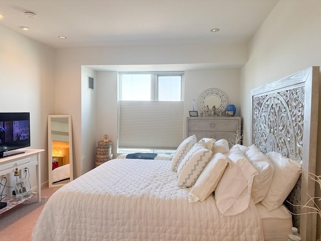 bedroom with carpet flooring and recessed lighting