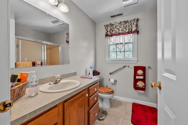 bathroom with a stall shower, baseboards, visible vents, tile patterned flooring, and vanity