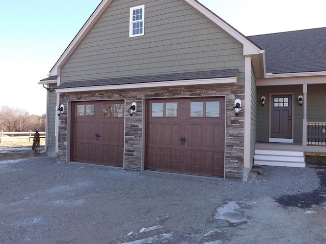 LOT3 Athol Rd, Phillipston, MA 01331 - view of front of house with stone siding, a garage, a shingled roof, and driveway