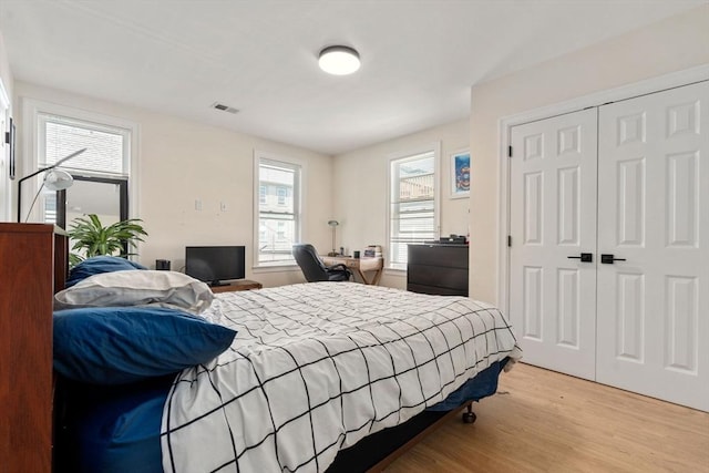 9-11 Dexter, Boston, MA 02127 - bedroom featuring light wood-style flooring and a closet