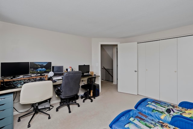 home office with light colored carpet