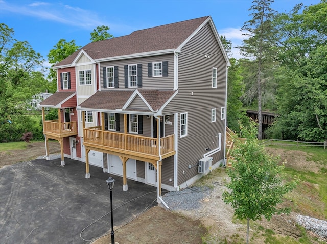 260 Main St Unit 12, Blackstone, MA 01504 - view of front facade featuring driveway, a shingled roof, an attached garage, and central AC