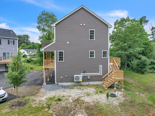 260 Main St Unit 12, Blackstone, MA 01504 - rear view of house featuring stairs, a cooling unit, and a deck