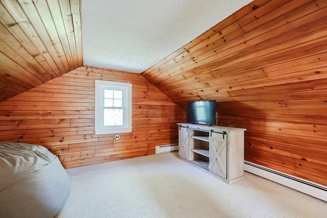 bonus room with carpet floors, wood walls, lofted ceiling, and a baseboard radiator
