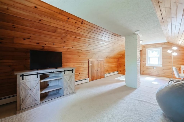 additional living space with wood walls, lofted ceiling, light carpet, a baseboard heating unit, and a baseboard radiator