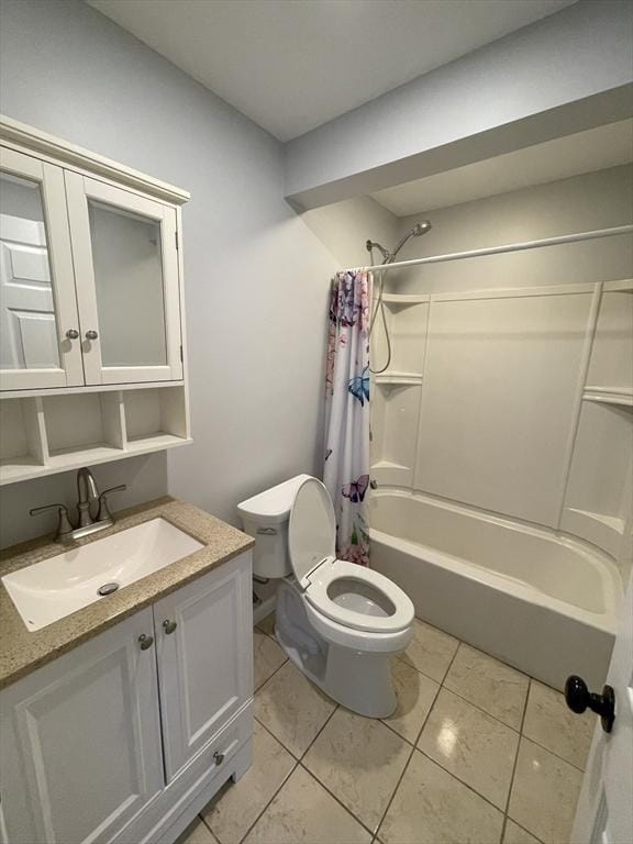 full bathroom with vanity, tile patterned floors, toilet, and shower / bath combo