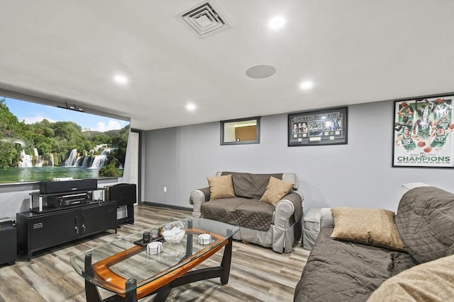 69 Greenwood St, Boston, MA 02122 - living room with light wood finished floors and recessed lighting